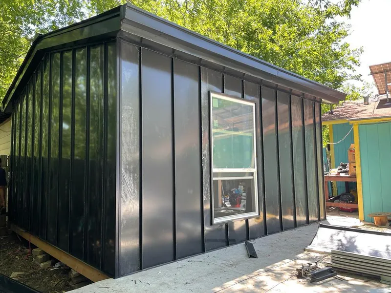 Black standing seam metal wall panels for Metal Roof Installation in Homewood