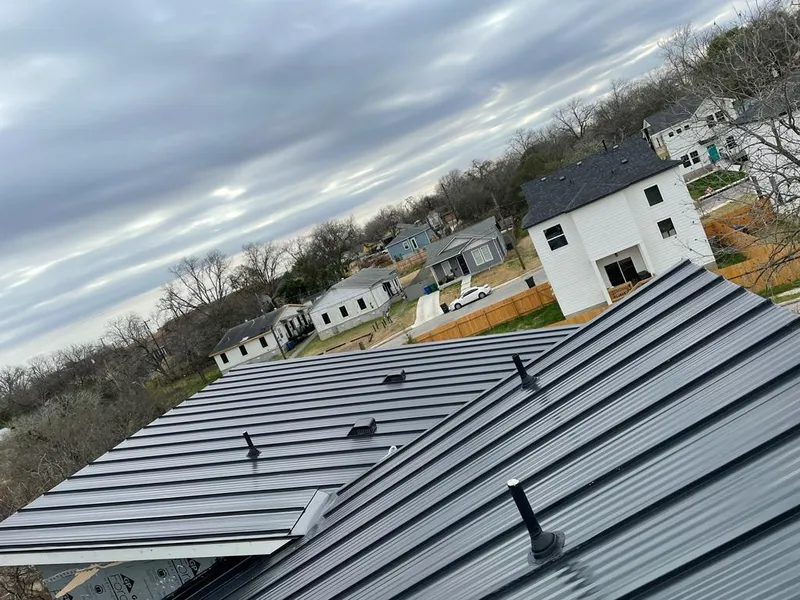 Standing seam metal roof panels with vents for Skylight Repair in Homewood